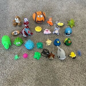 Assorted Colorful Small Toy Monsters Squish Rummer Duck Plus and Plastic Animal
